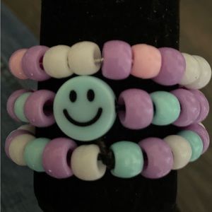 Bracelet set of three, purple and blue themed.